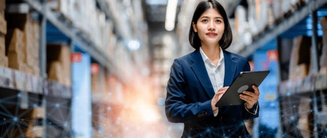 Woman walking through facility print and mail services provider